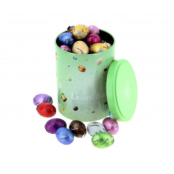 Cylindre métal garni de 400 g de petits œufs en chocolat Leonidas Cylindre métal garni de 400 g de petits œufs en chocolat Leonidas