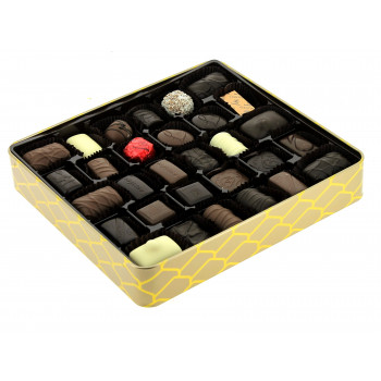 Coffret métal garni de 490 g de chocolats Leonidas